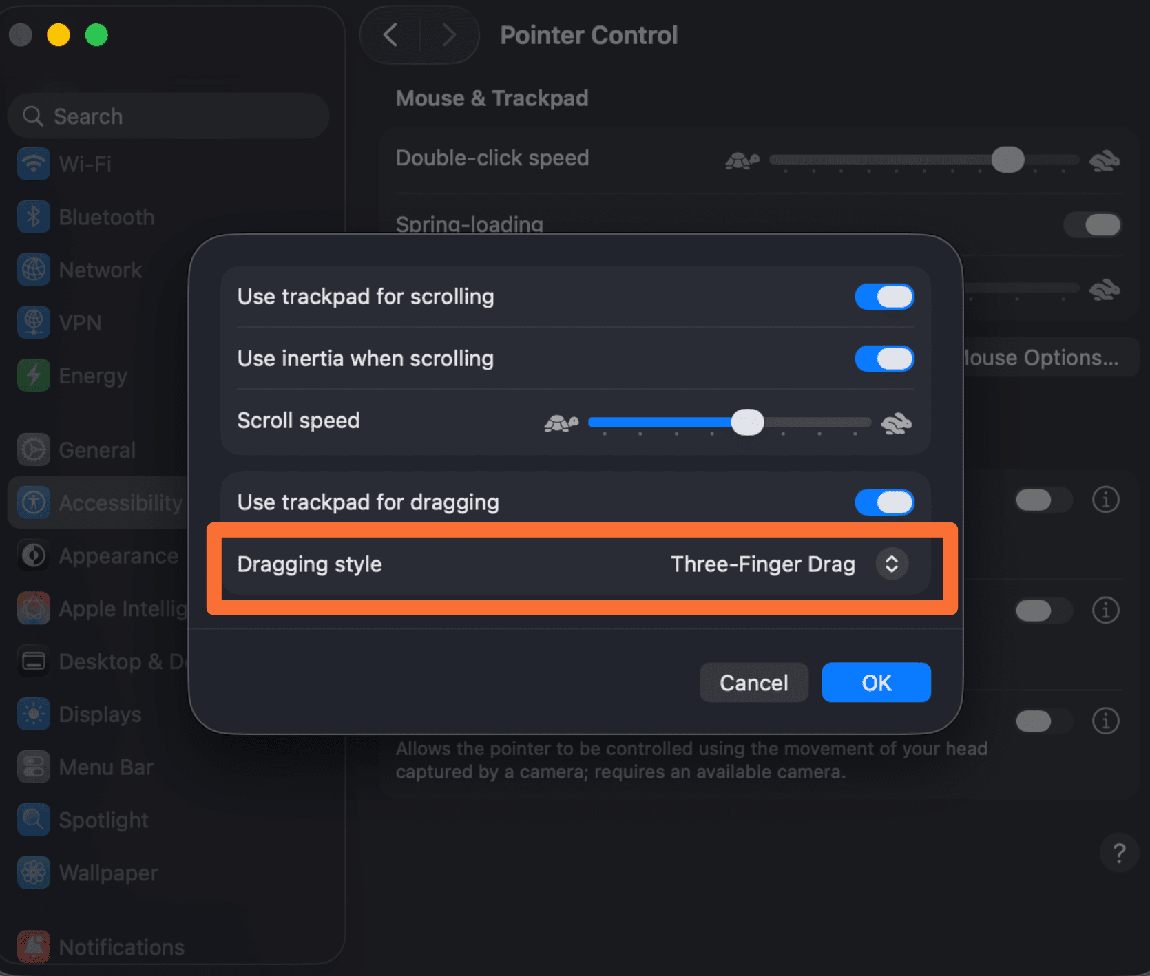 The macOS Trackpad Options dialog, with Dragging style set to Three-Finger Drag.